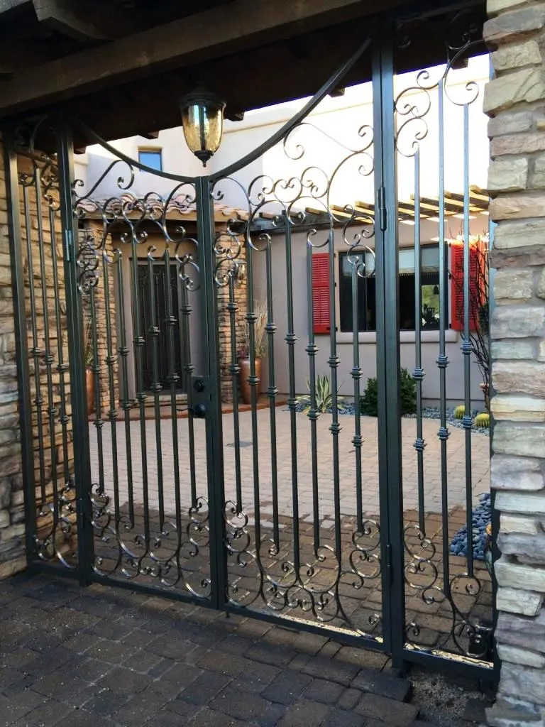 Ornamental courtyard gate from an SG Fabrication install