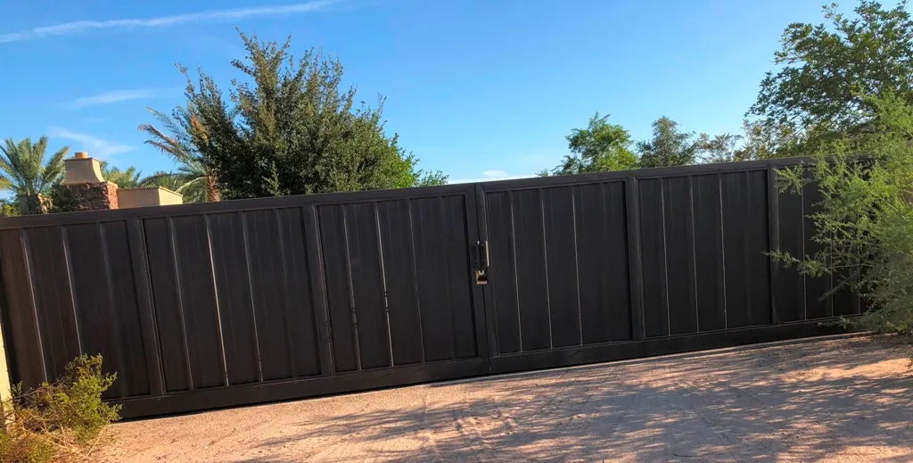 Custom steel driveway gate installed by SG Fabrication